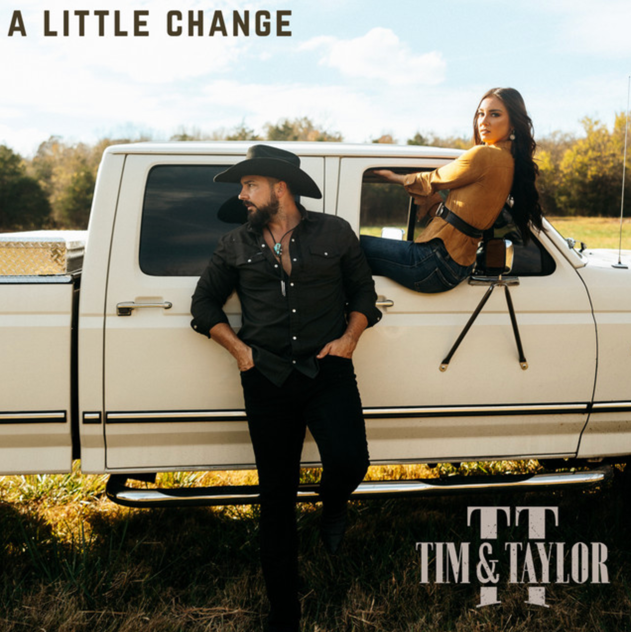 Tim & Taylor A Little Change single cover art, the duo with a vintage white pickup truck in a field